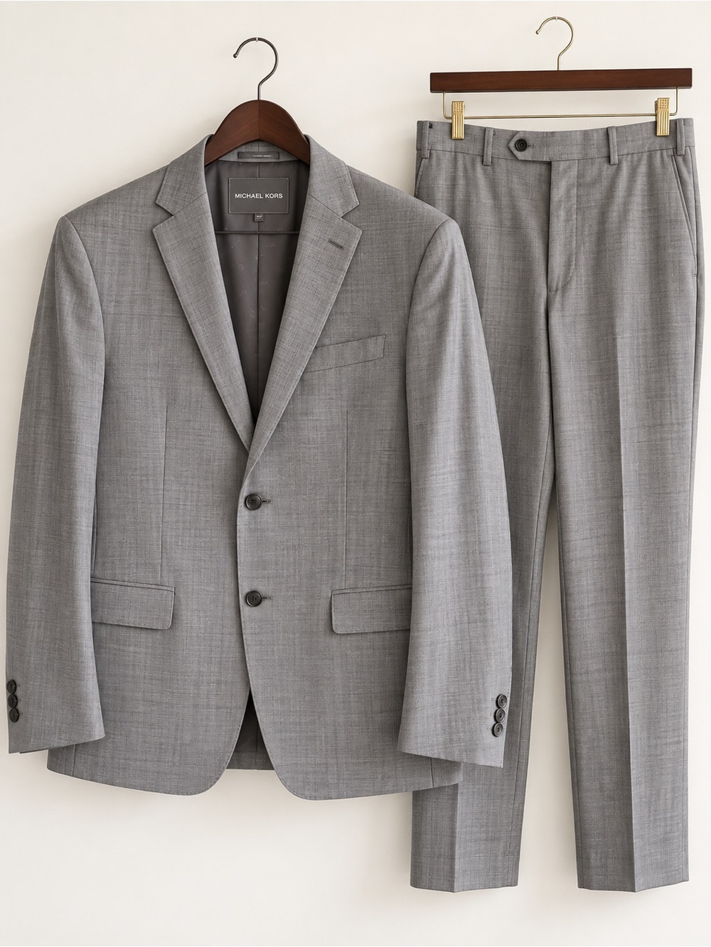 Michael Kors men’s 2-piece suit in light grey. Size 42R jacket / 36W x 32L pants